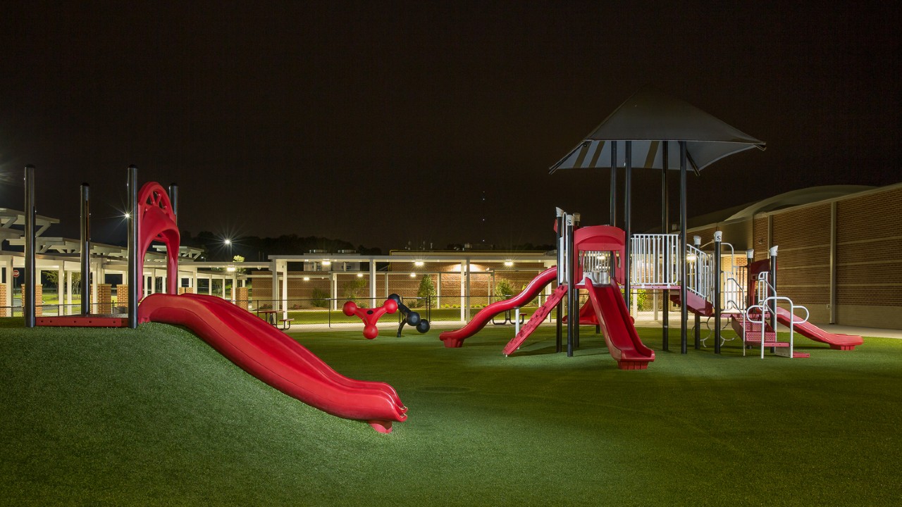 Nighttime artificial turf playground by Southwest Greens of Eastern Washington